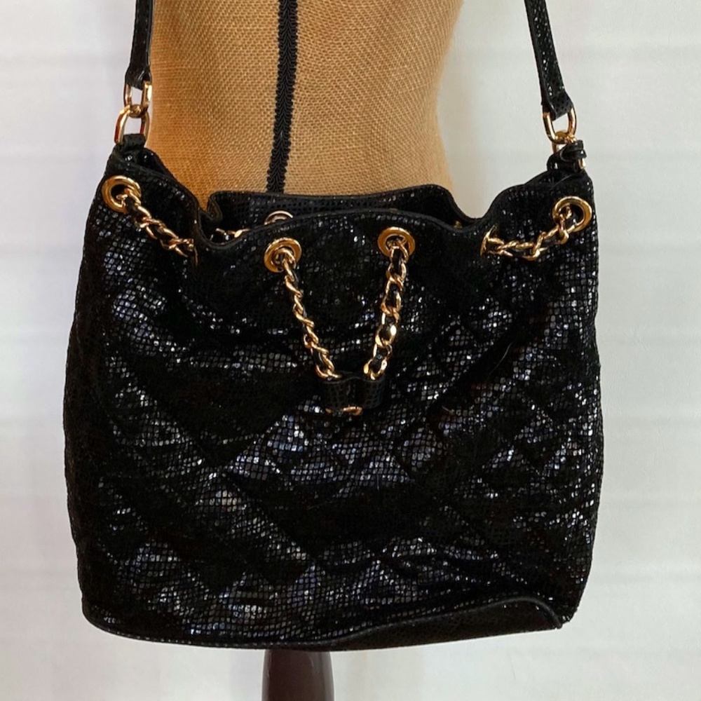 Michael Kors black snake skin shoulder handbag with brass accents